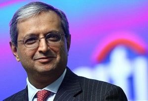 Headshot of Vikram Pandit in front of a Citigroup logo